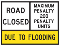 Image of a restricted road use sign that closes the roads because of flooding.