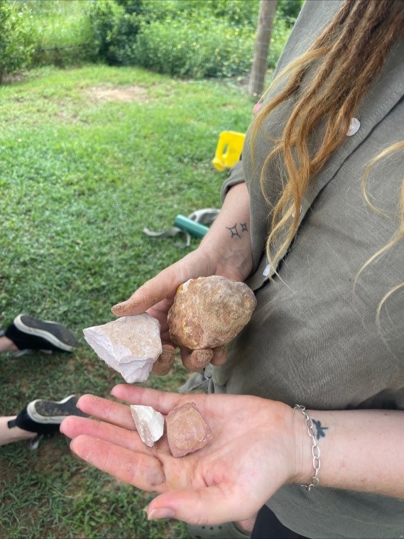 photo of a lady holding rocks in her palm
